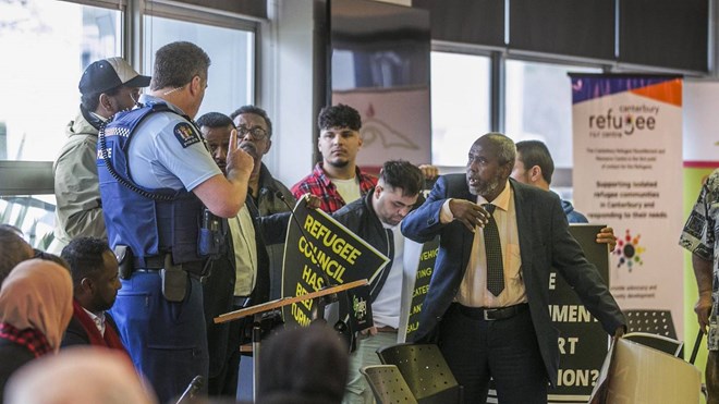 Mahmed Jama, right, was amongst the protesters who ambushed Saturday’s World Refugee Day event.JOHN KIRK-ANDERSON/STUFF/STUFF