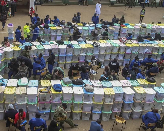 Ballot boxes lie stacked in rows at a tallying center in Nairobi, Kenya Wednesday, Aug. 10, 2022. Kenyans are waiting for the results of a close but calm presidential election in which the turnout was lower than usual. (AP Photo)